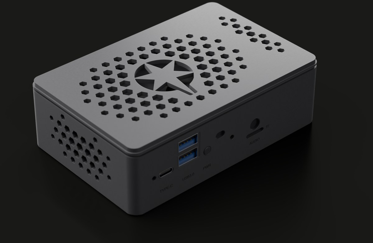 ANCLA One «Prometeo» en negro: la estrella de ANCLA calada en la tapa entre la rejilla hexagonal, y en el frente los puertos USB-C, USB 3.0, audio y tarjeta.